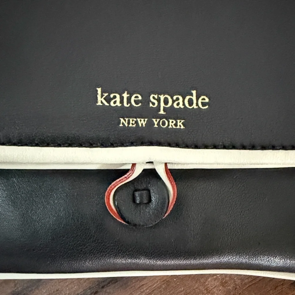 Kate Spade Remi Black and Cream Foldover Clutch Wallet with polka dot interior